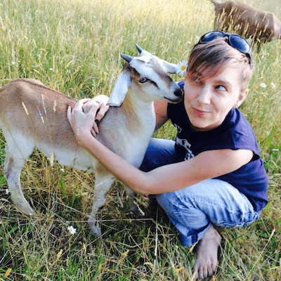 Sharing a hug with a goat friend